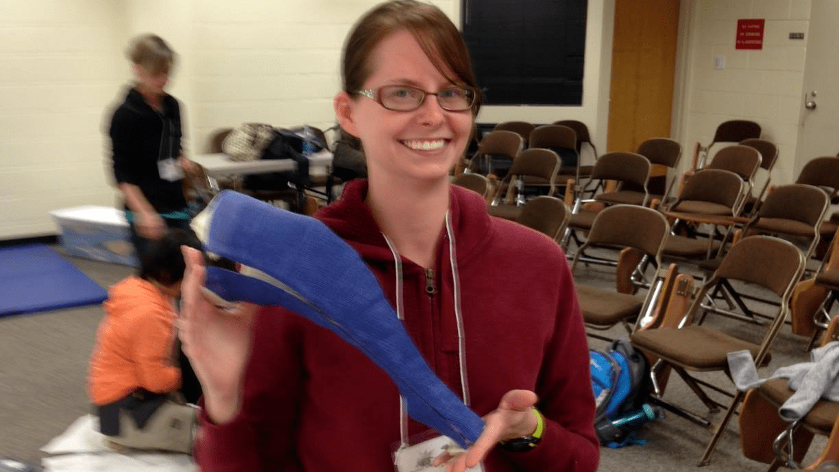 Veterinarian hold up a cast for a custom dog brace