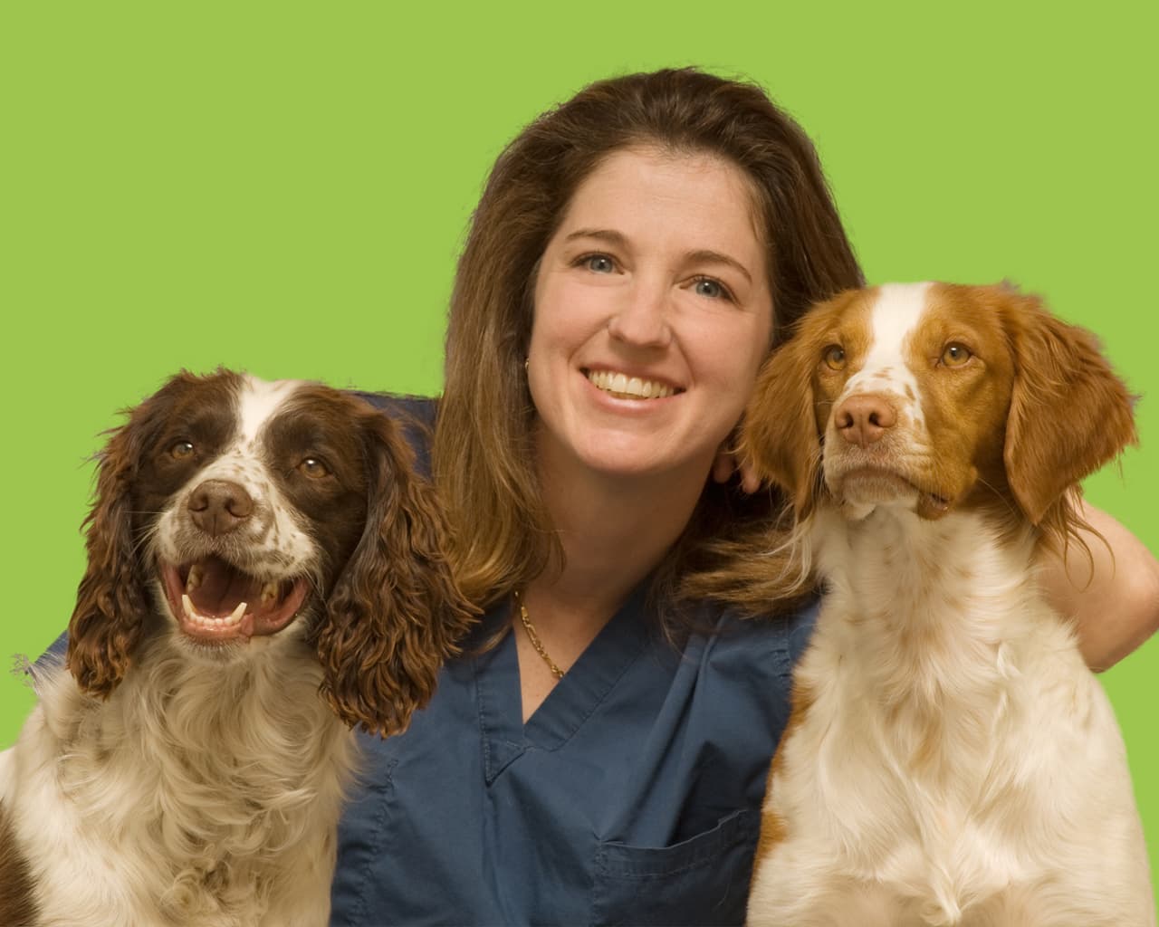 Carrie Adrian PT possing with her two dogs