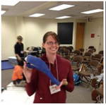 Veterinarian holding a stifle cast for a brace